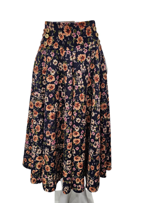 falda botones con lasito navy/beige floriado