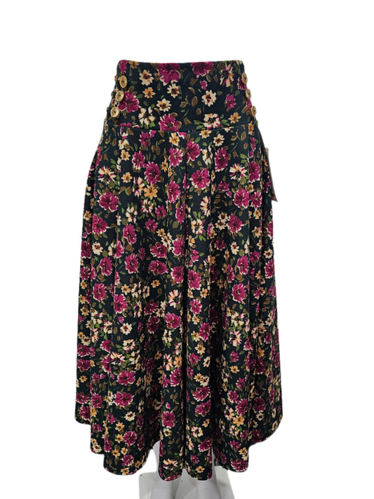 falda botones con lasito verde/morado floriado