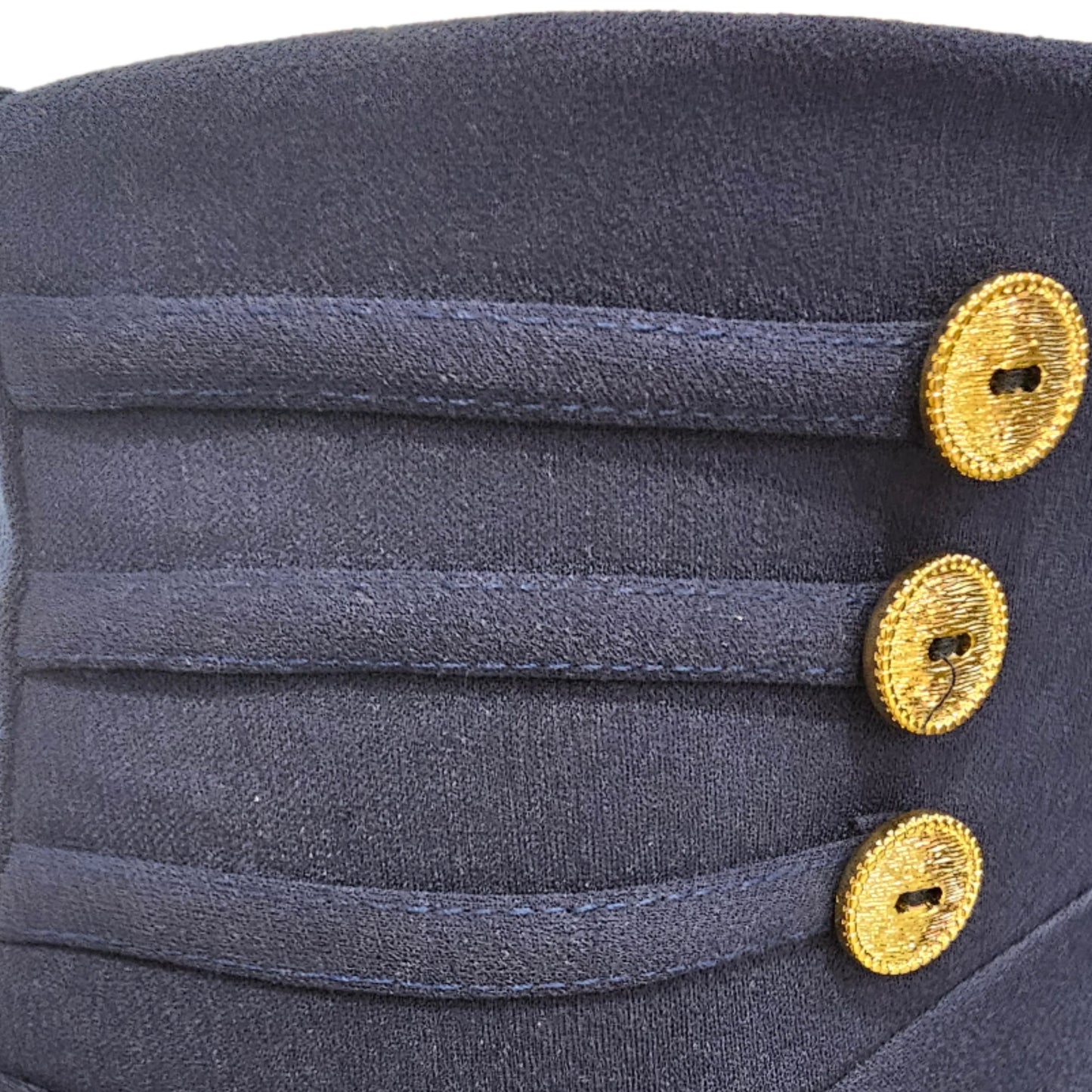 Buttoned skirt with long navy blue bow