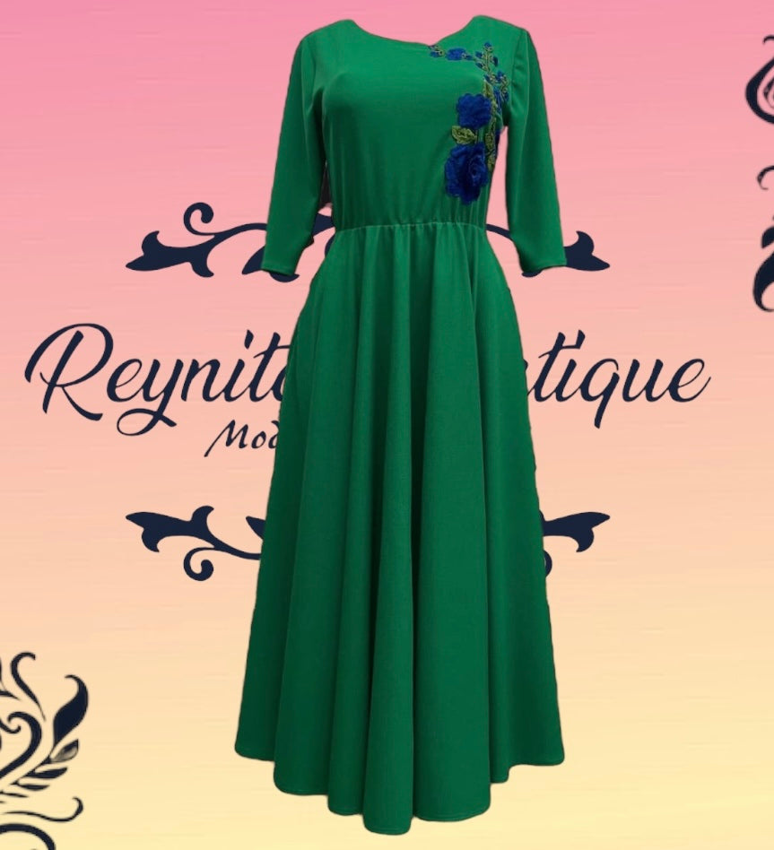 Green dress with blue rose design